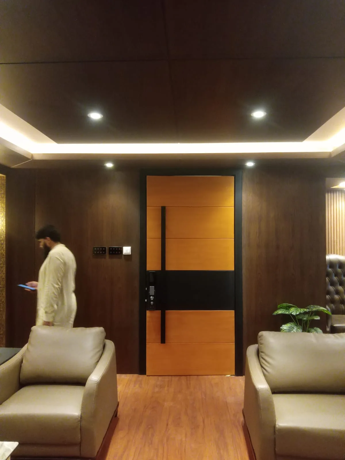 Executive office interior with custom wall panelling and joinery