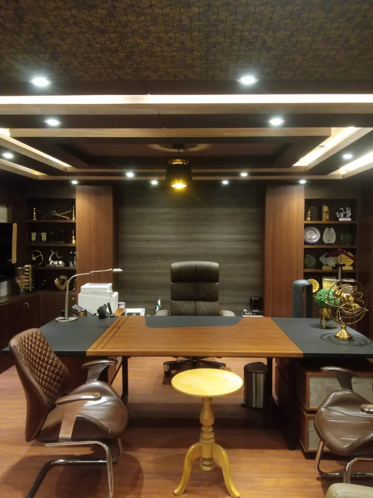 Executive office interior with custom wall panelling and joinery