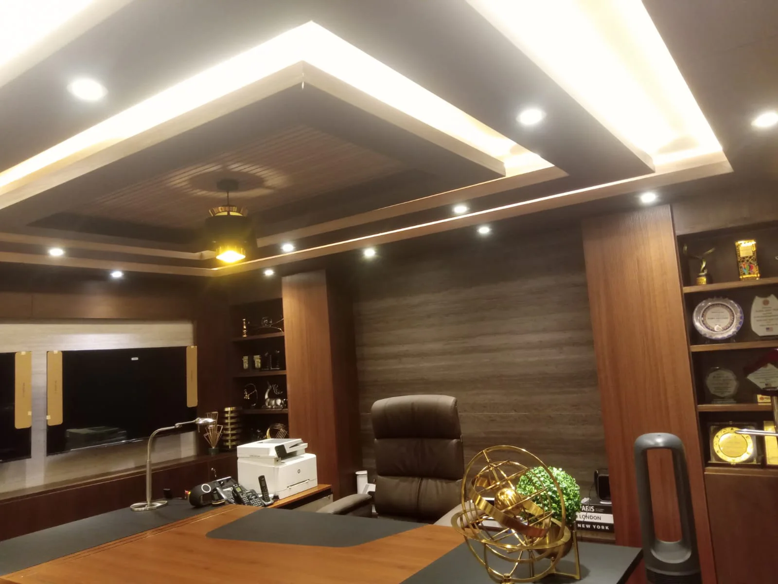 Executive office interior with custom wall panelling and joinery
