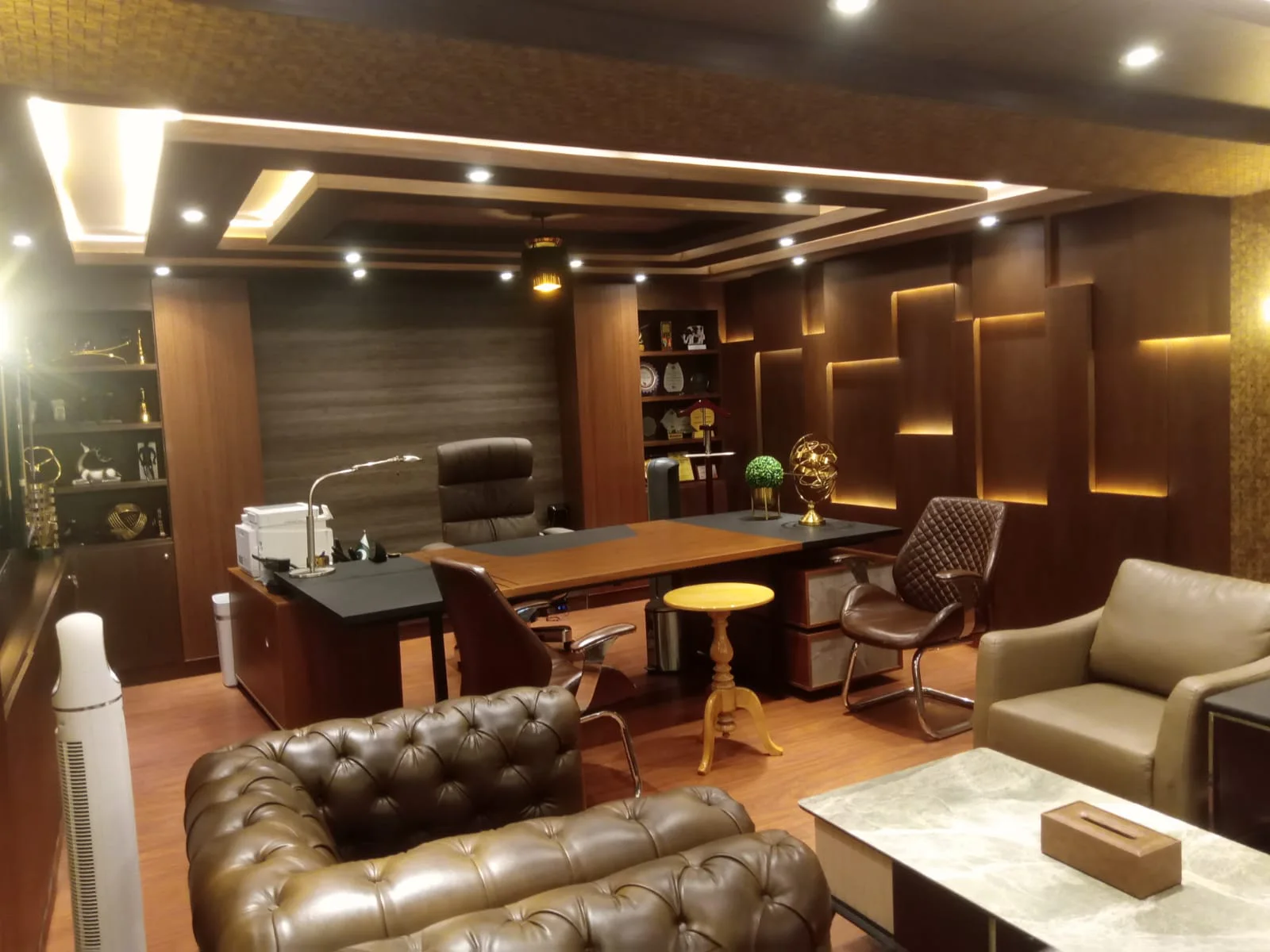 Executive office interior with custom wall panelling and joinery