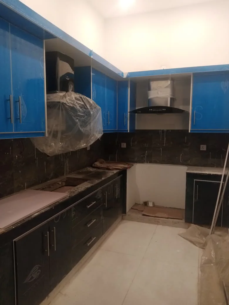 Modern L-shaped kitchen with custom cabinets