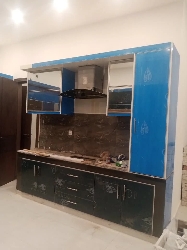Modern L-shaped kitchen with custom cabinets