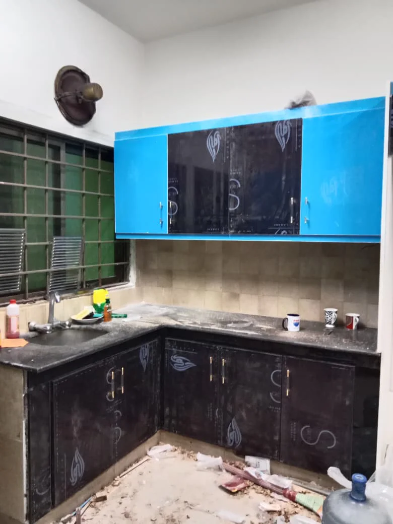 Modern L-shaped kitchen with custom cabinets