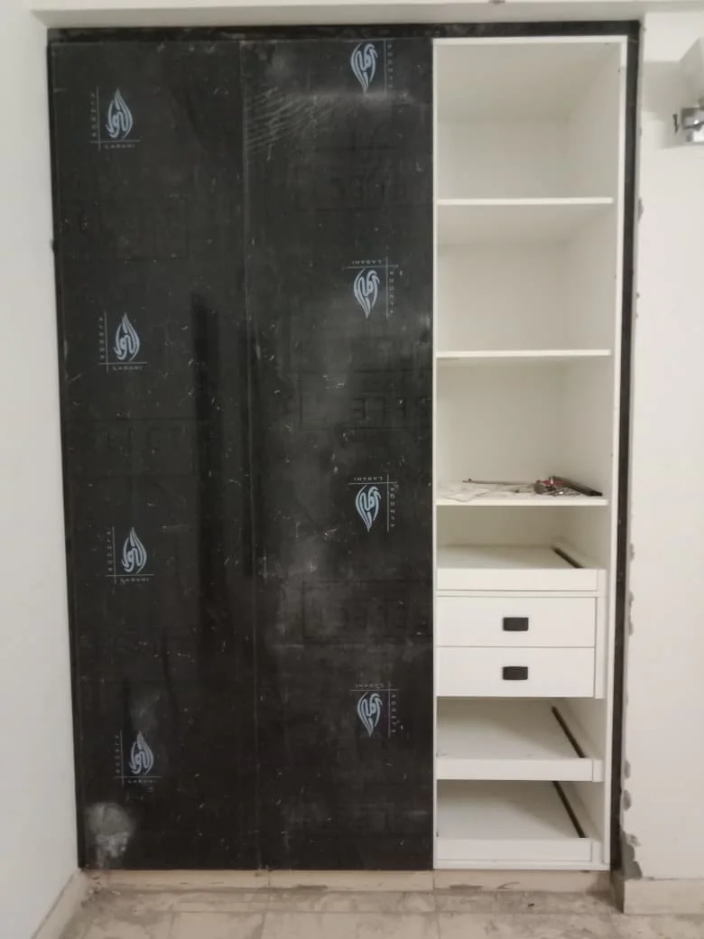 Custom media wall and wardrobes