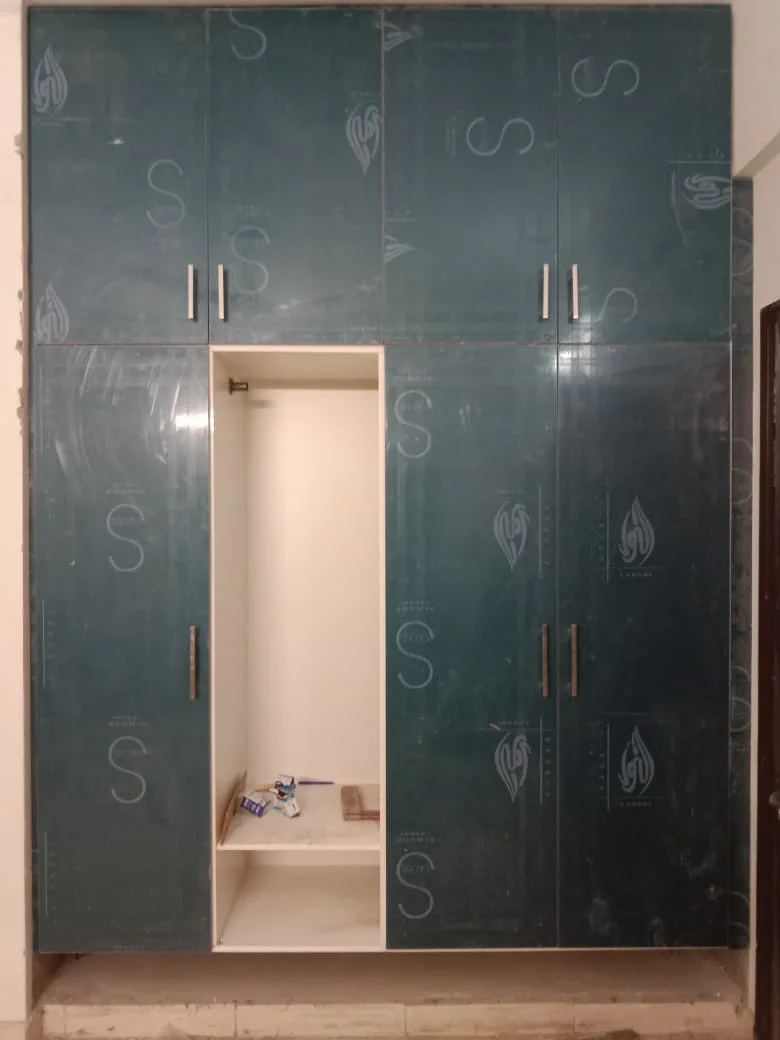 Custom media wall and wardrobes