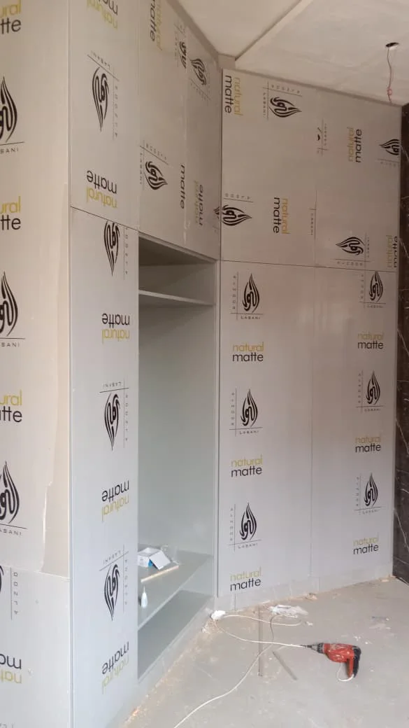 Custom media wall and wardrobes