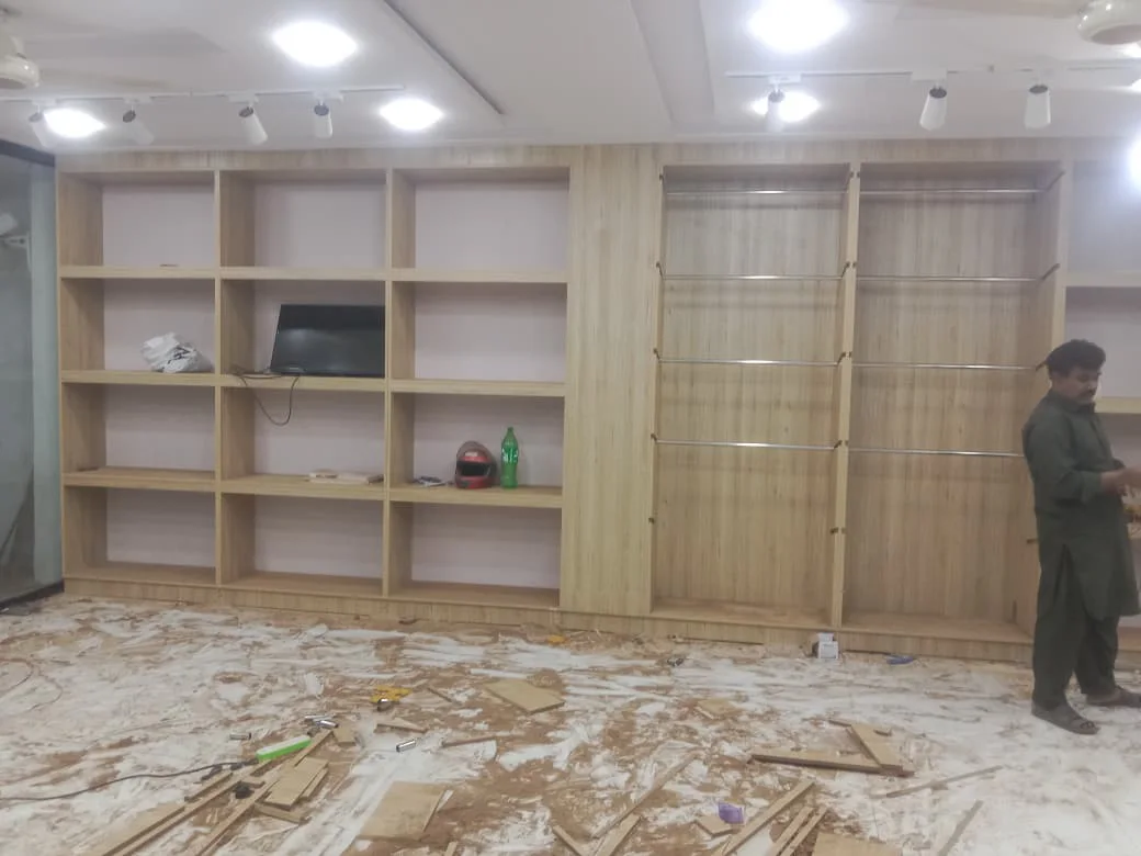 Wooden wall shelving / Rack at cloth shop