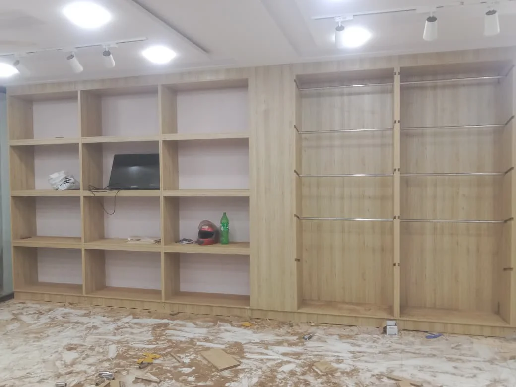 Wooden wall shelving / Rack at cloth shop